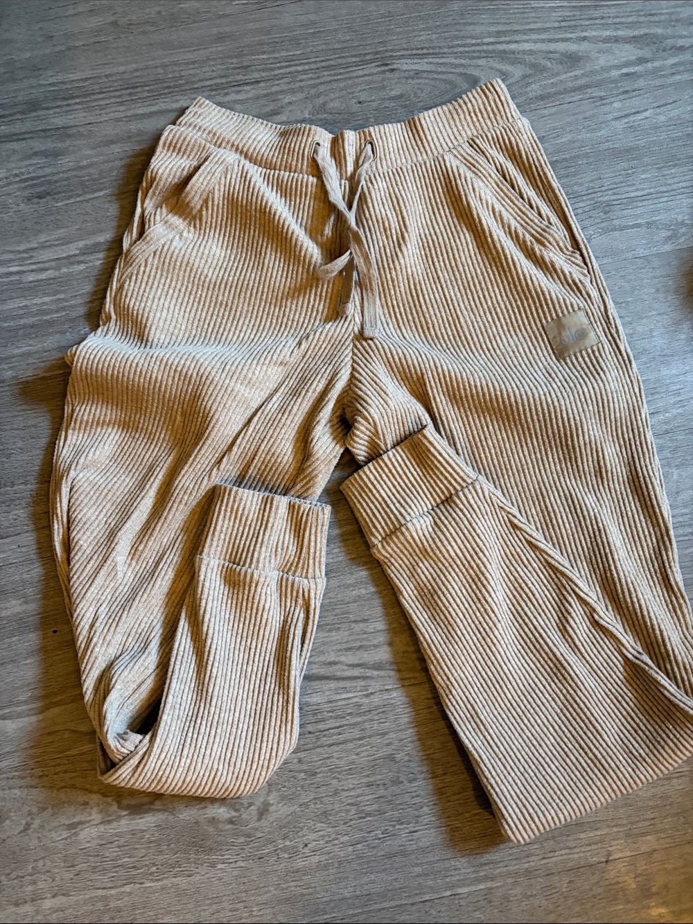 ALO Yoga Ribbed Knit Joggers in Light Beige
